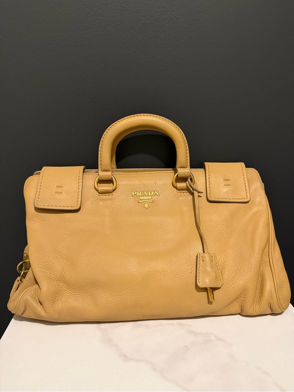 Prada Pebbled Leather Satchel in Mustard